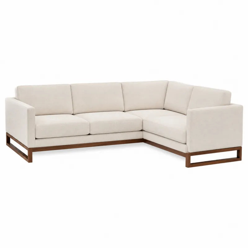 Narożna sofa modułowa kremowa z drewnianą podstawą